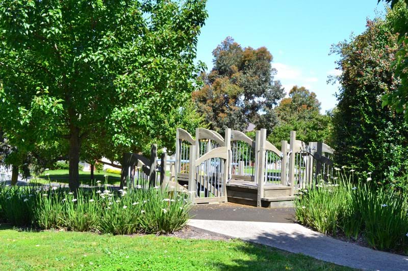 A photo of the gardens in the Kingston Heath Estate featuring Dinsan Nursery's quality wholesale plants.